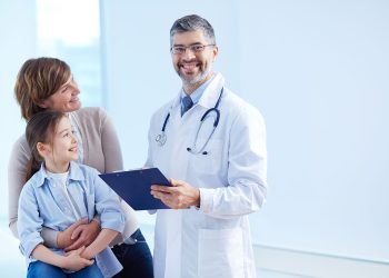 happy-doctor-holding-clipboard-with-patients-sterify